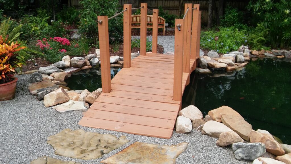 A pond with rocks and plants in it